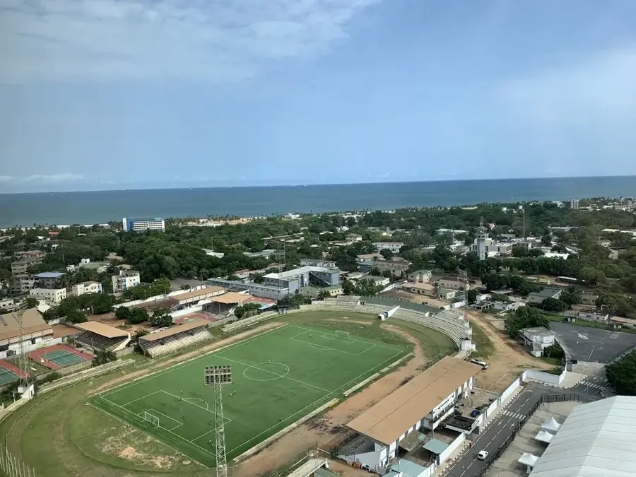 Városi Stadion (Lomé) — Nemzeti Egység Emlékműve (Togo)